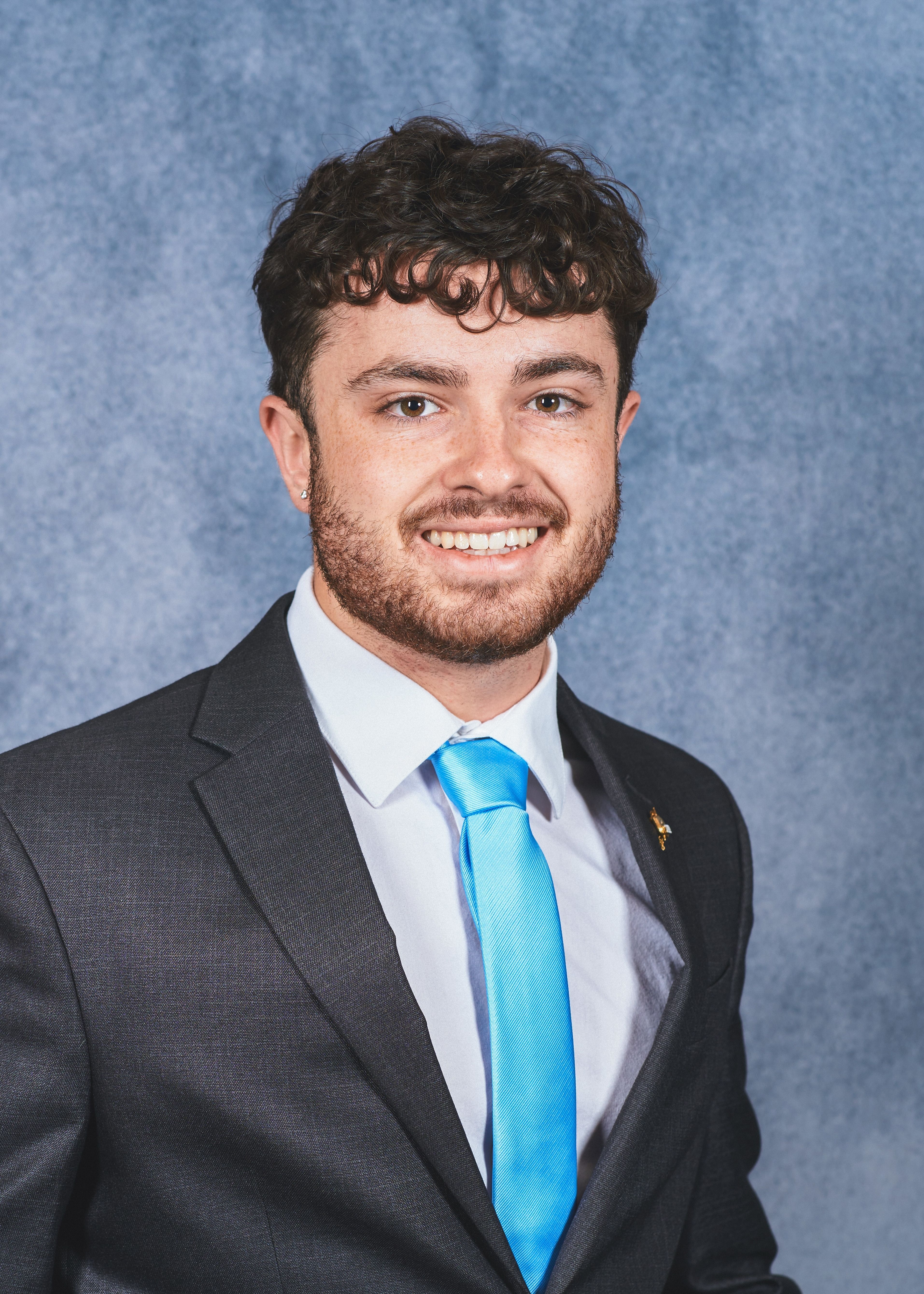 Professional headshot of Samuel McCarty